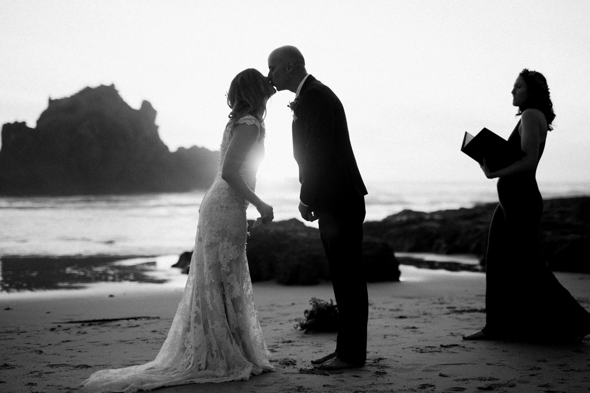 Des Moines Wedding Photographers A couple eloping at Pfeiffer Beach in Big Sur