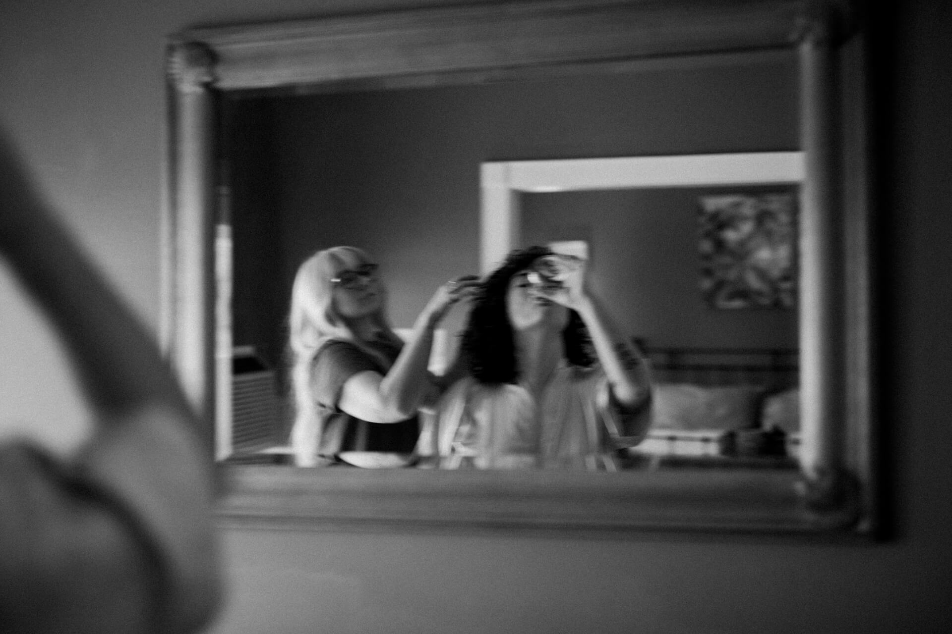 Des Moines Elopement Photographers a bride finishing her drink before the elopement