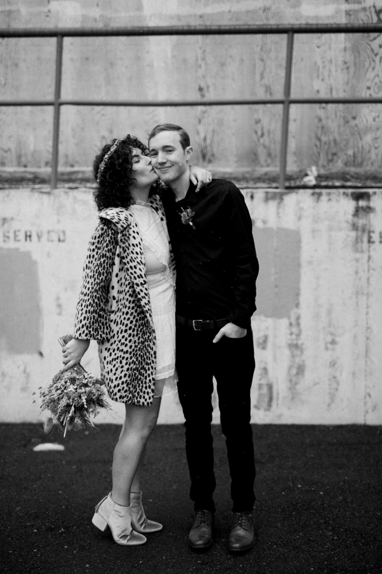 Des Moines Wedding Photographers Bride and groom pose for a portrait after their elopement