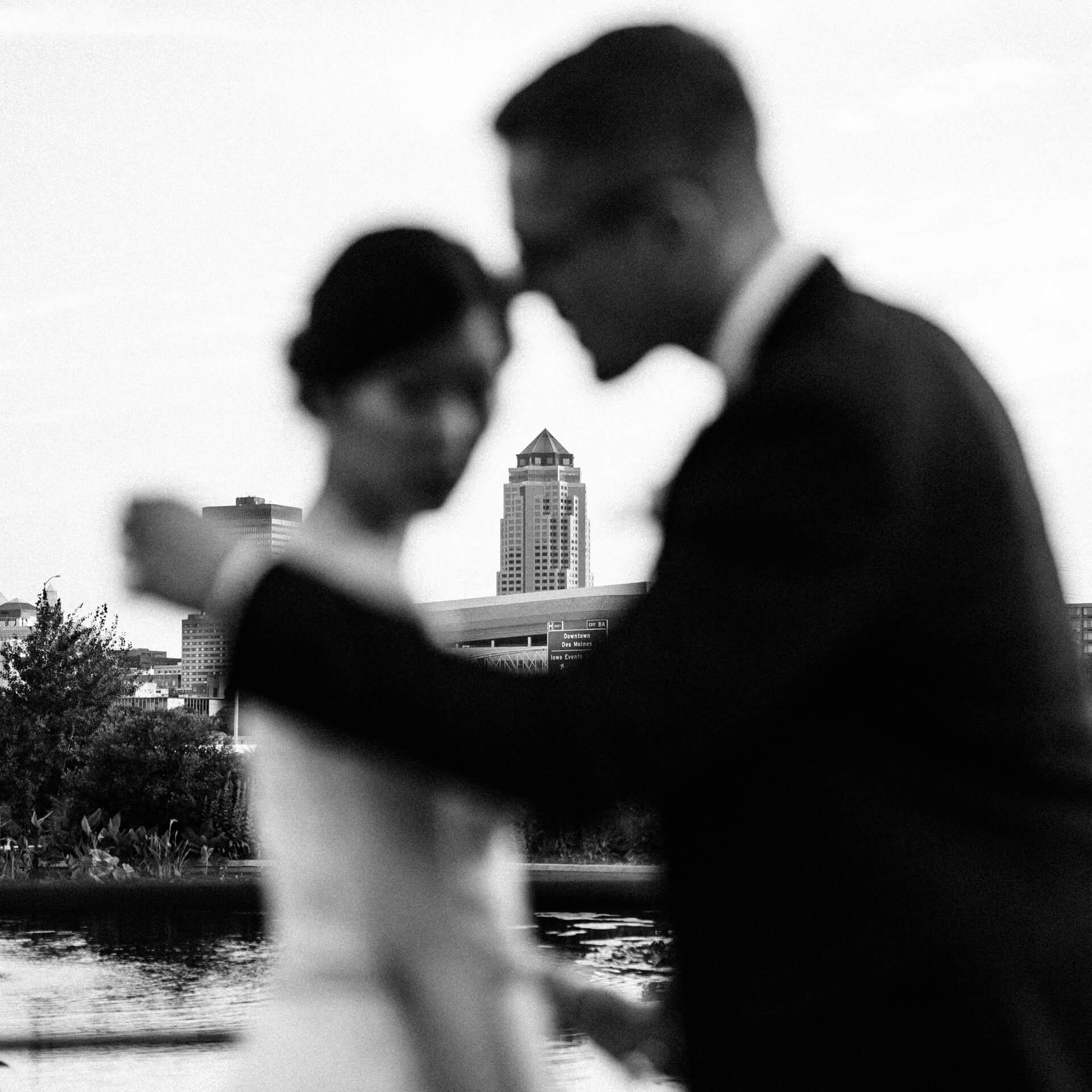 Iowa Wedding Photographers | Cluney Photography Des Moines Wedding Photo with Skyline in background