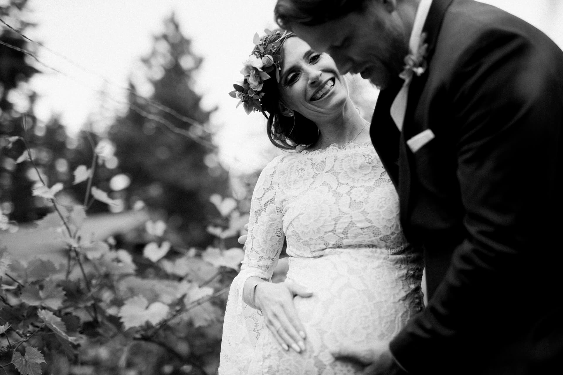 Des Moines Wedding Photographers expecting bride and groom